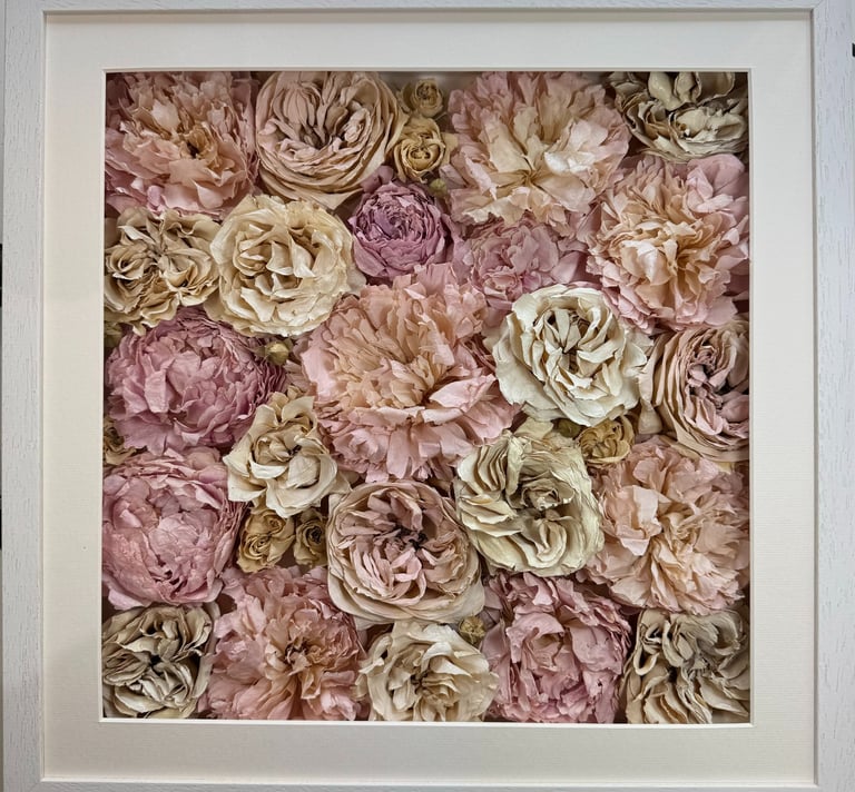 a close up of a flower wall preserved wedding bouquet