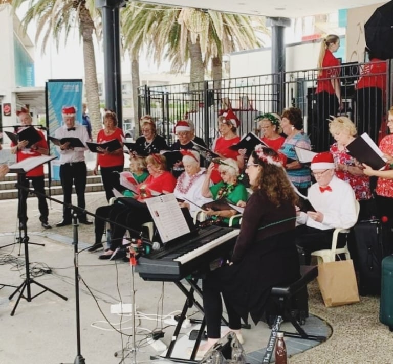 The District Singers perform at Cronulla Mall