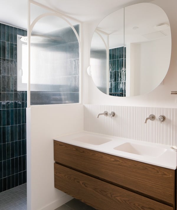 a hallway with a large window and a door