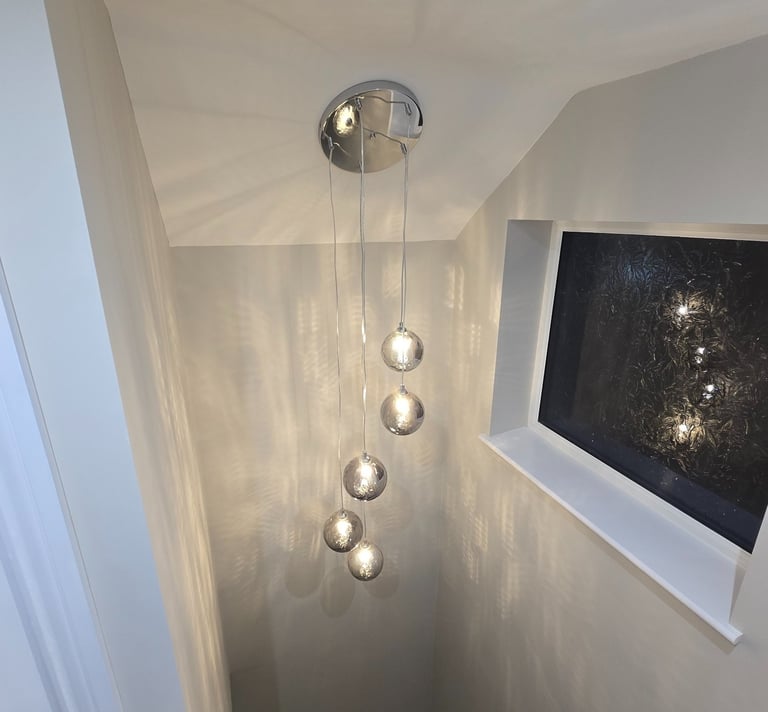 Hanging light in the stair well installed by Easy Spark Ltd in Bromley Kent