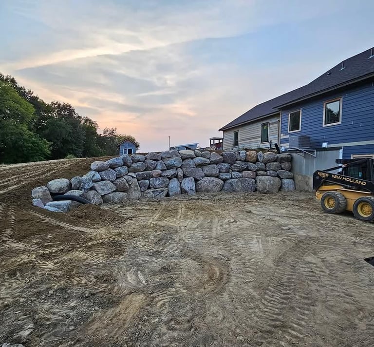 Boulder wall at residential home in Cokato MN