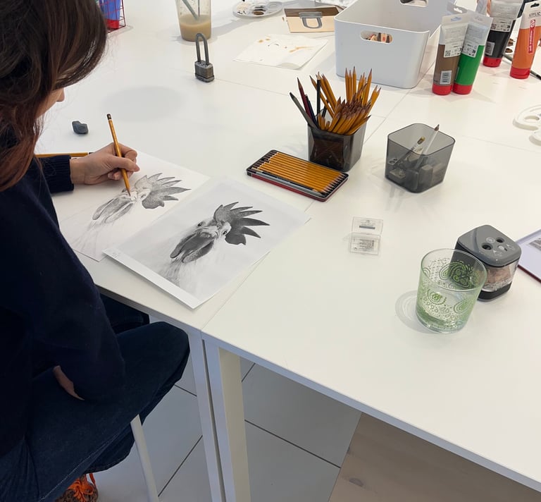 beginner art class working quietly in Turin studio