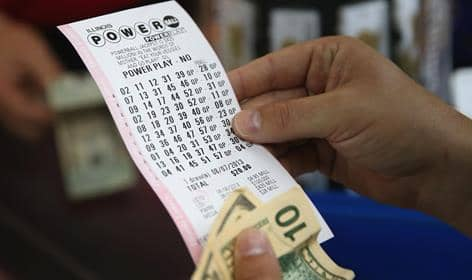 Lottery play slip with money