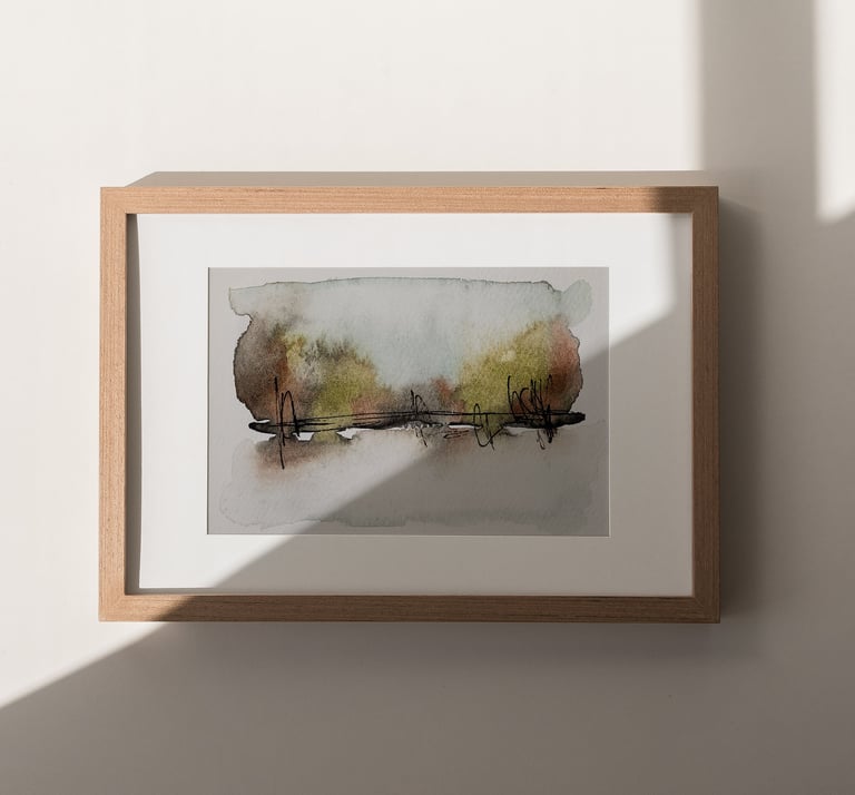 framed abstract landscape watercolor painting by Sweet Ruby Moon in warm natural light and wood frame
