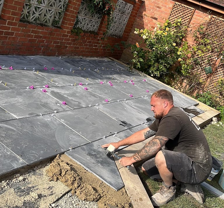 Experienced building contractors in Worcester discussing project plans on-site
