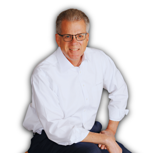 Dale Usher wearing a white shirt and glasses