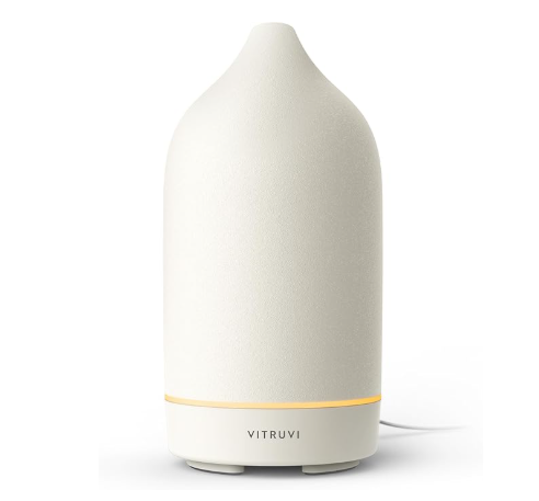 Vitruvi Stone matte ceramic ultrasonic essential oil diffuser for aromatherapy.