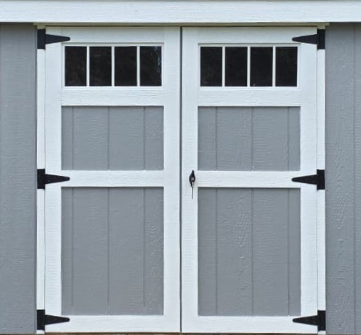 Custom shed door with transom window built in Halifax, Massachusetts showcasing craftsmanship and design.