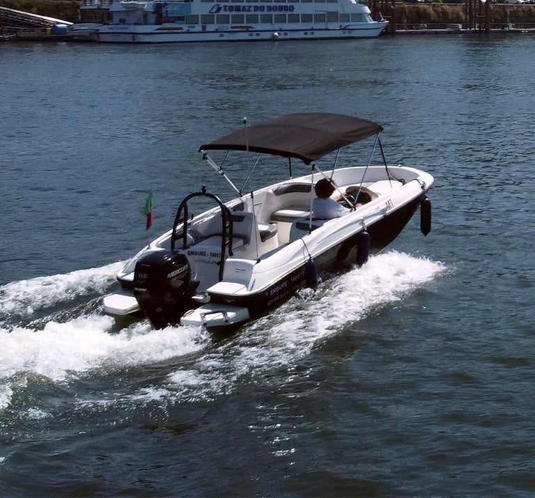 The Endure speedboat cruising on the Douro River