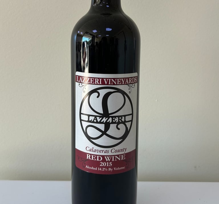 A close up picture of a wine bottle labeled 2015 Red Wine