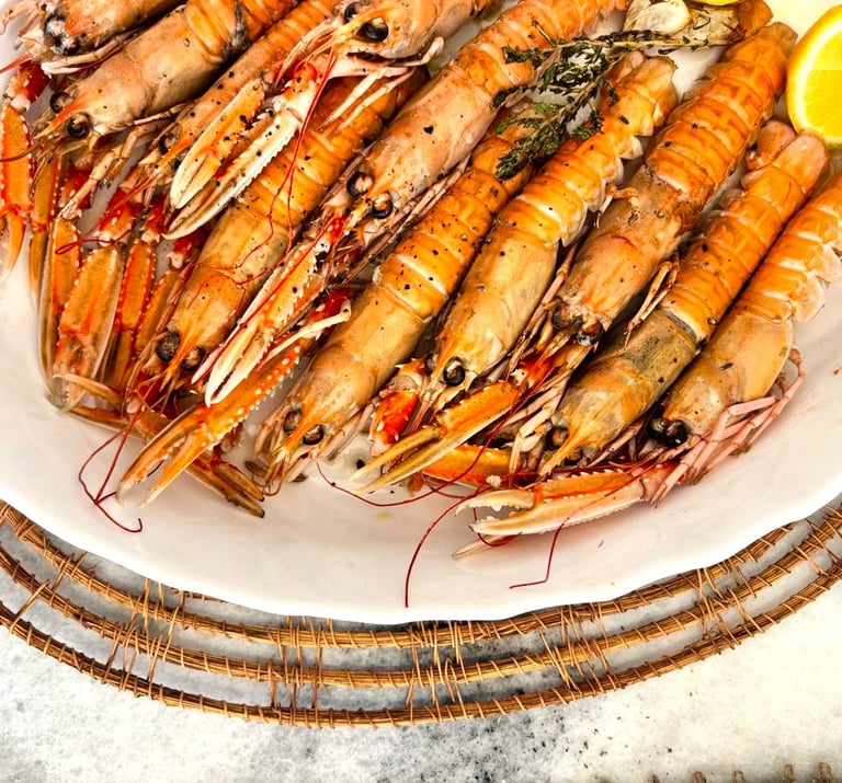 Grilled fresh langoustines prepared by villa eats private chefs Naxos served at a villa in Naxos