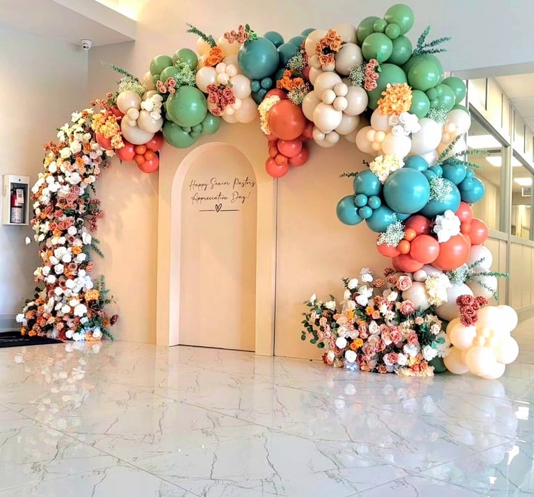 Balloon garland + floral package rental
