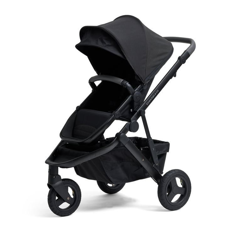 Product photography - a black baby stroller with removable seat