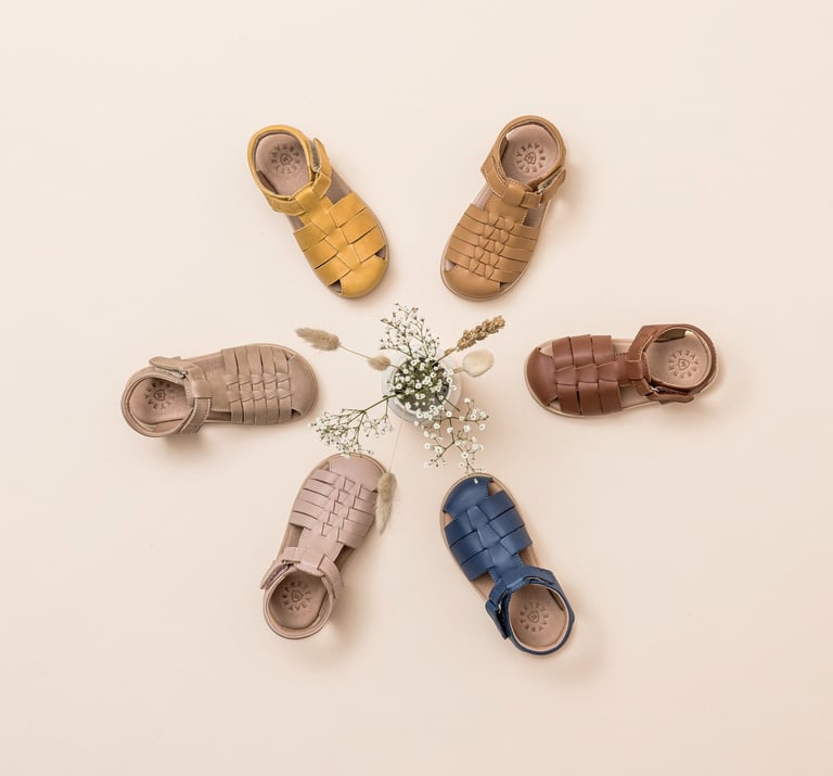 Product photography - a group of baby's shoes