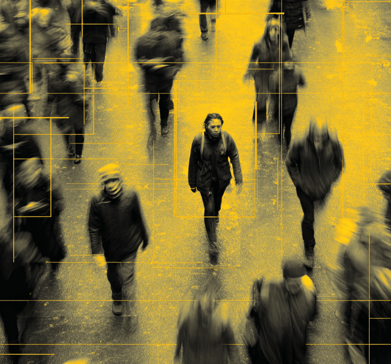 a woman walking through a crowd of people