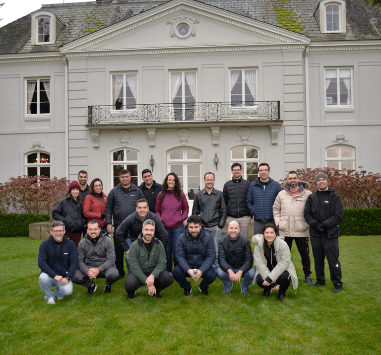 team posing after a Bloedel Reserve hike during a Seattle team building retreat
