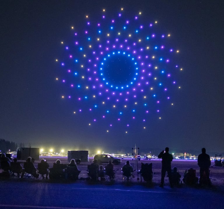 Futuristic yet amazing drone show forming a glowing wormhole effect in the night sky by SkyFiesta.