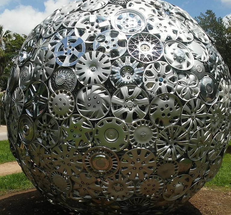 Globe made out of recycled hubcaps