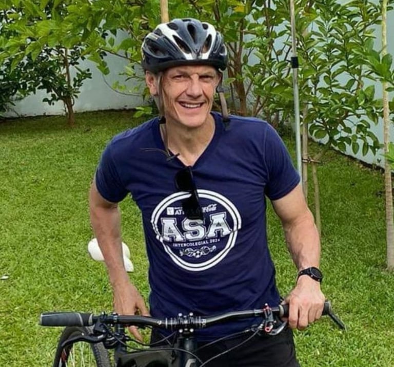 Christian brother Jeff Healy with bicycle in Paraguay