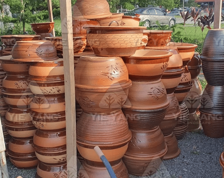 Stacked terracotta ceramic garden pots at nursery – Yie Yang Landscape