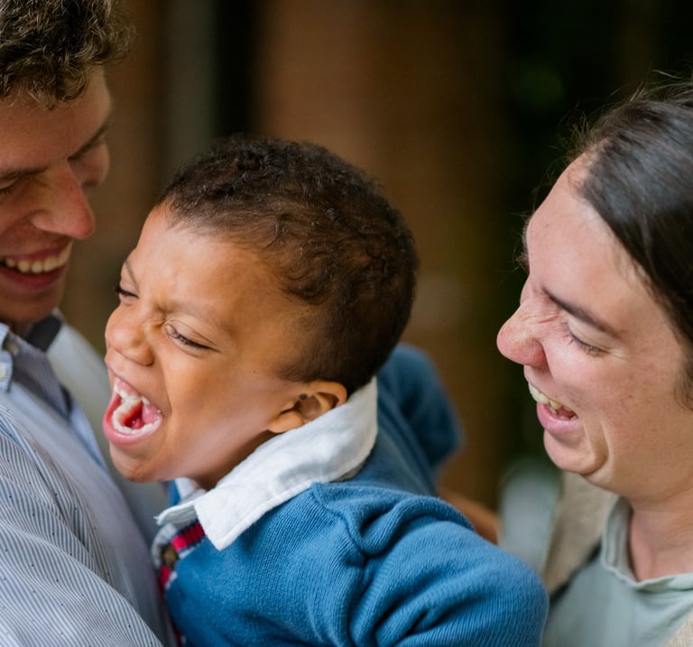 Adoption photographer and videographer capturing family moments in Colombia