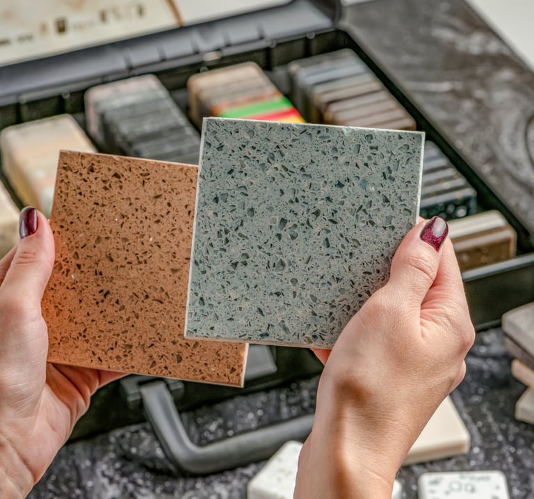a woman holding a piece of granited stone