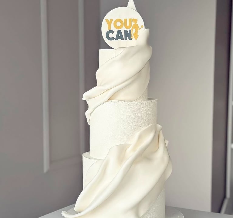 a cake with a white cake topperf and a cake topperf
