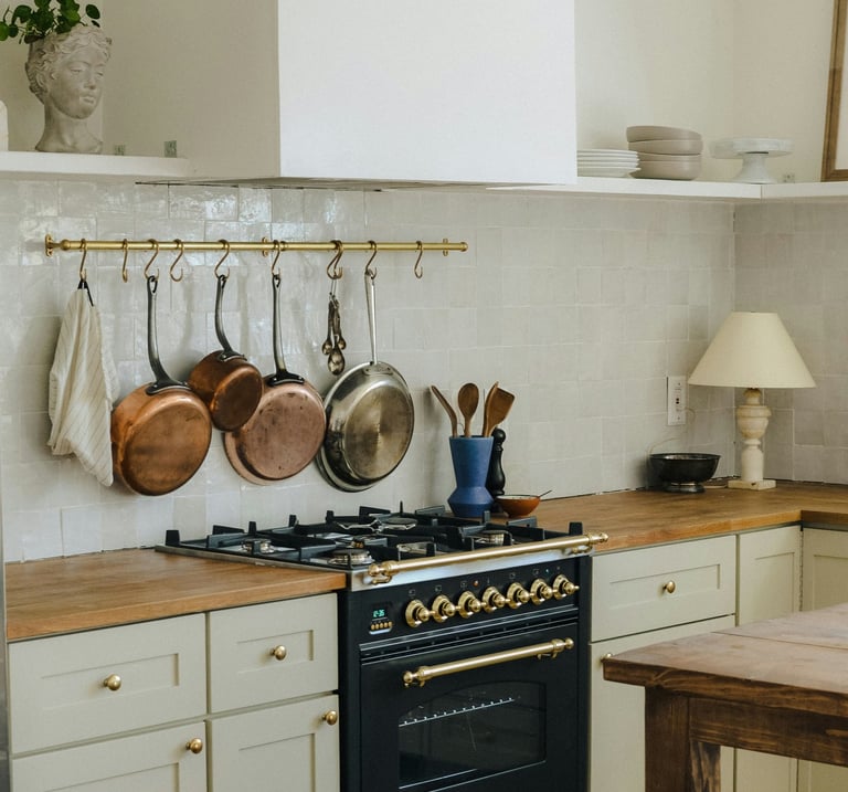 Upmarket kitchen with black and gold luxury oven