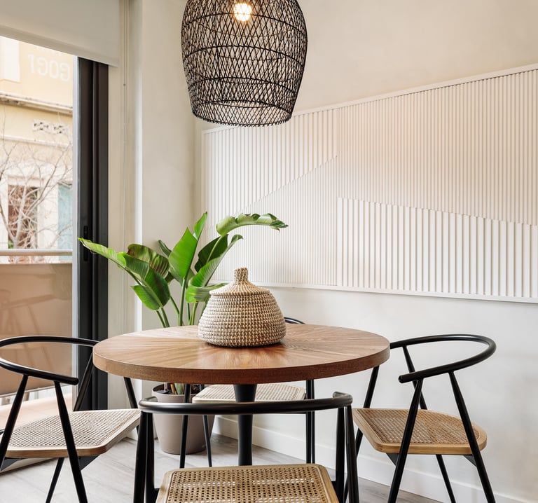 Elegant dining area with bespoke relief wall panels and contemporary furniture and sleek design