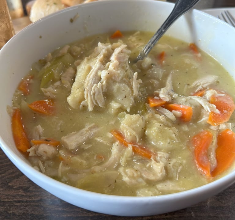 a bowl of Chicken and Dumpling soup