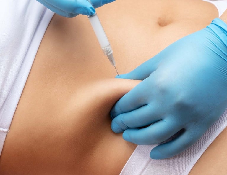 a woman getting a mesolipo