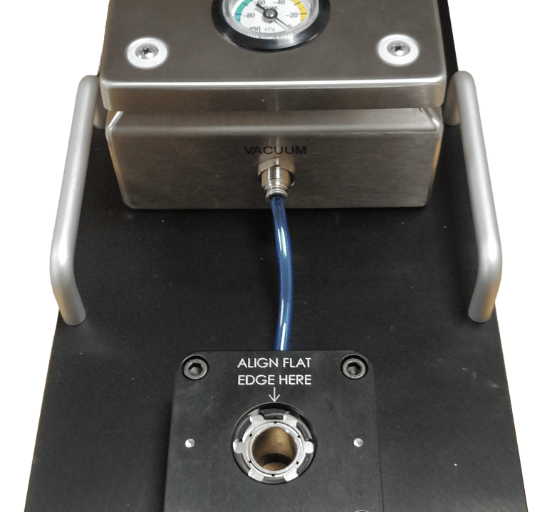 Vacuum metrology fixture for holding a soft rubber medical dome