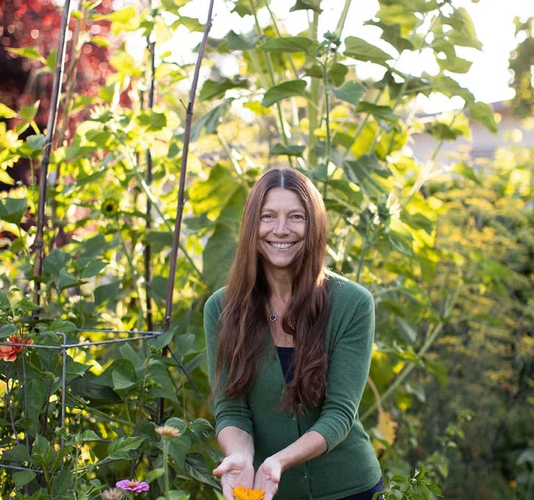 Tina Lilly, MS, LPC in her Portland garden