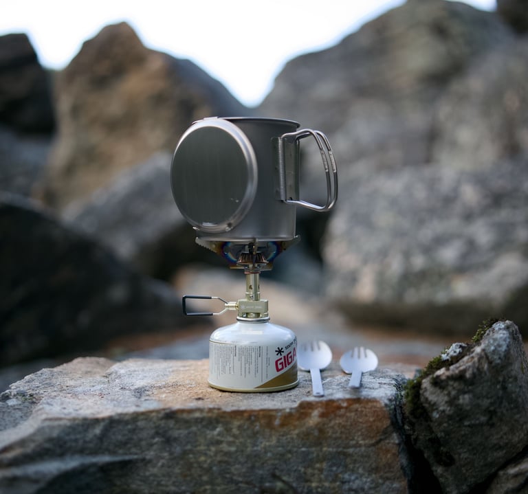 Snow Peak Trek 700 on top of titanium backpacking stove.