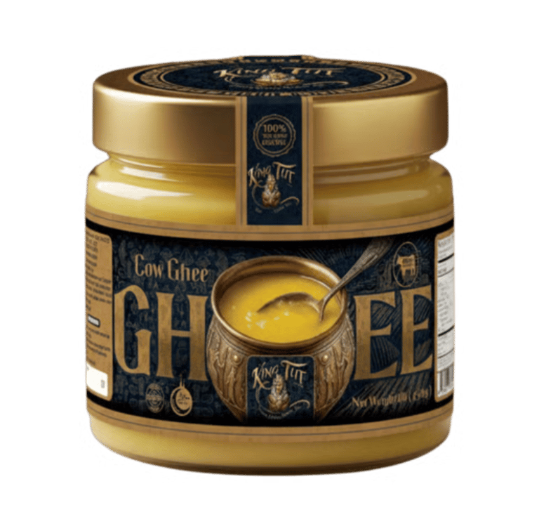 A glass jar of premium King Tut Cow Ghee with a gold lid and elegant vintage-style label.