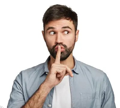 A man holding a finger over his mouth to signal to keep secrets