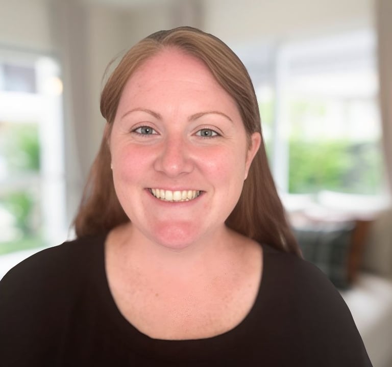 a woman with a smile on her face