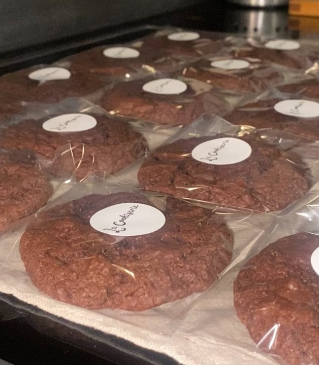 a tray of cookies with labels on them