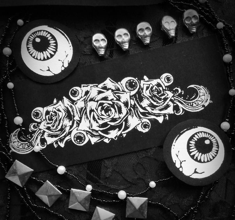 creepy but elegant roses and eyeballs patches