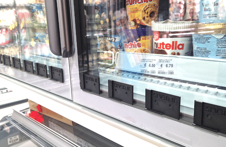 a display case with a variety of food items