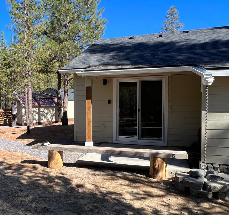 entrance to guest suite and a bench in the background