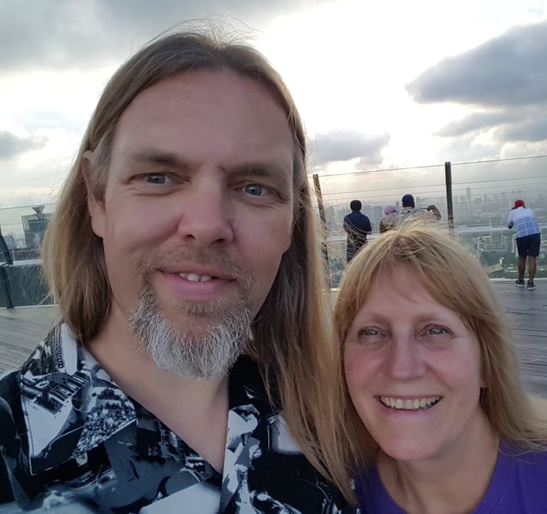 Sean and Patsy in a selfie photo in Singapore