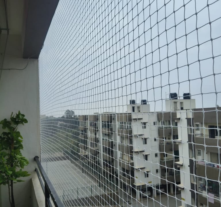 a balcony with a view of a city skyline