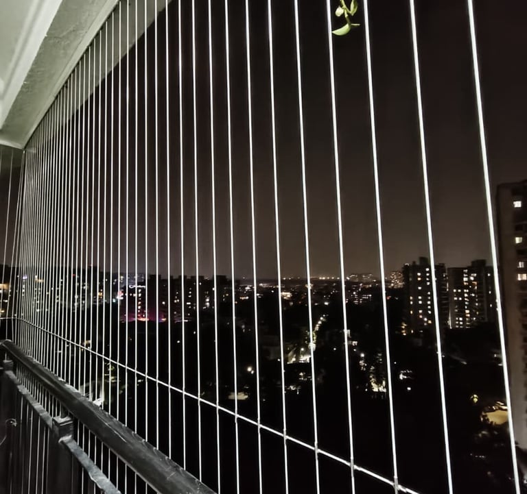 invisible grills installed on balcony in bengaluru
