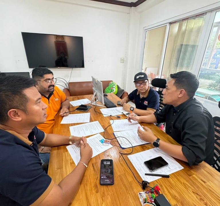 Group Consultation Around Table “Legal team consultation with clients in Pattaya office – Chan Legal