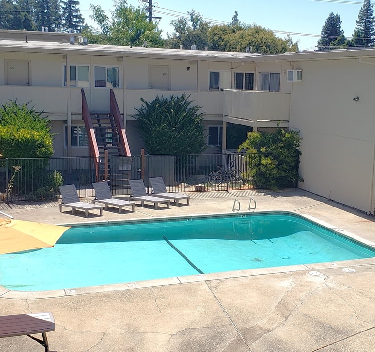 pool and patio at university commons apartments davis california