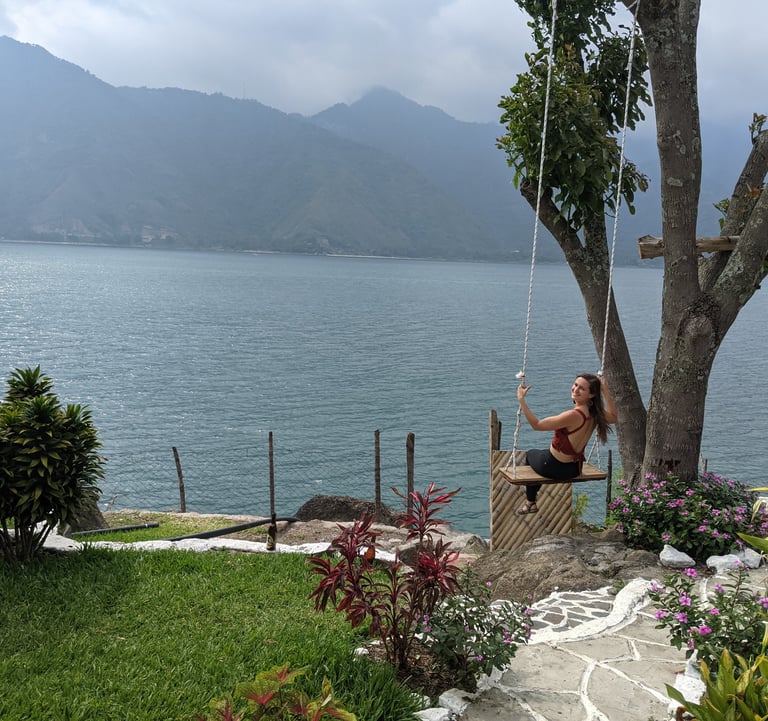 playing with a swing on Lake Atitlan, Guatemala