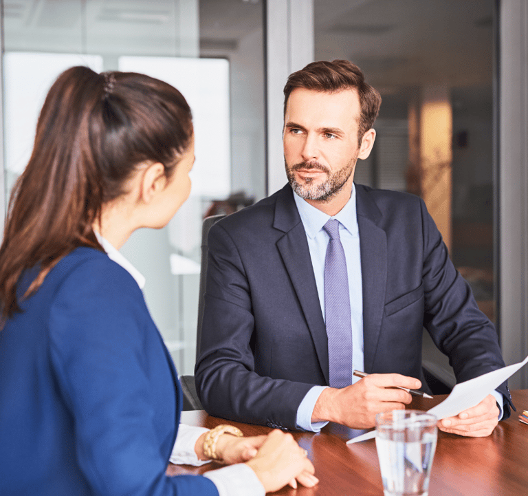 nfl football jobs employee conducting a resume review with potential job candidate