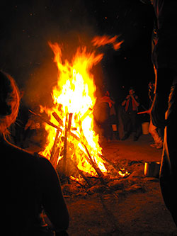Sacred fire circle ceremony at night, guiding transformation and community