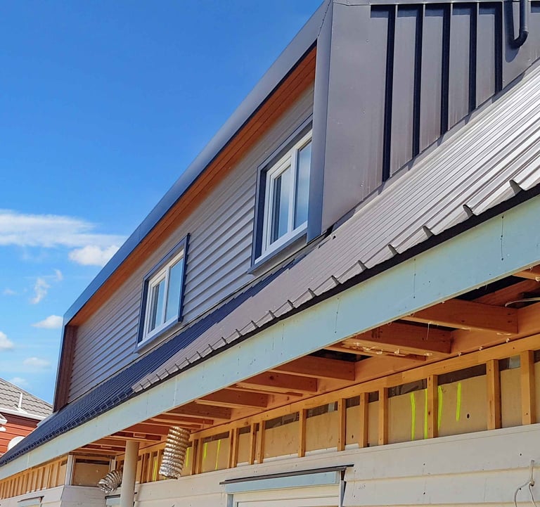 Home renovation with new cladding and roofing—preparing your home for winter with essential upgrades to stay warm